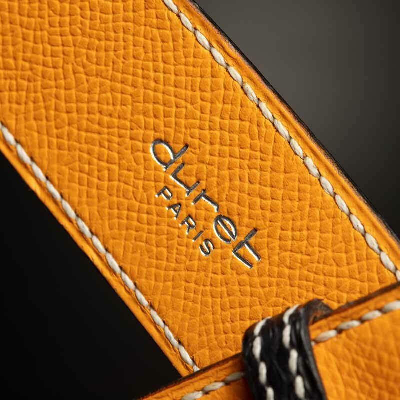 ceinture en python gris-noir, intérieur jaune et boucle Delta 3