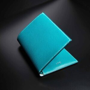 portefeuille Iota en calf grainé turquoise 1